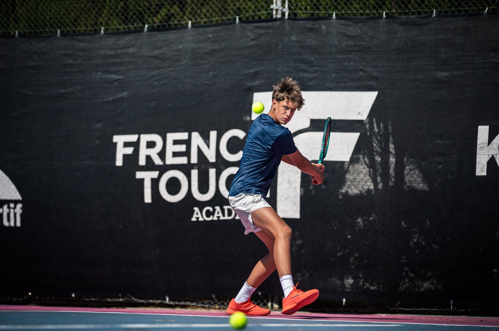 Maxon Maximilian Suchodolski playing tennis